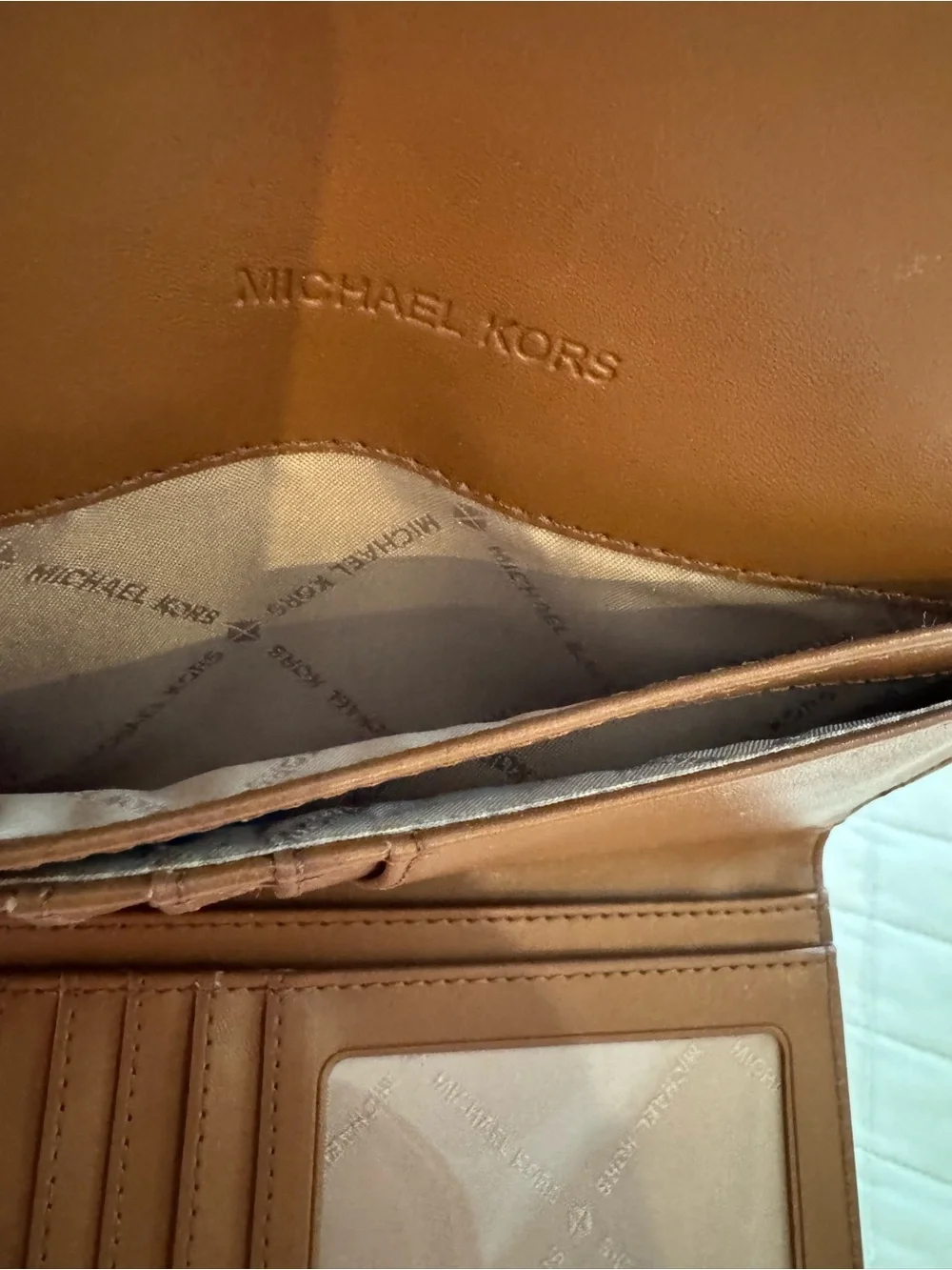 Michael Kors Taupe Signature MK Clutch with Gold Logo